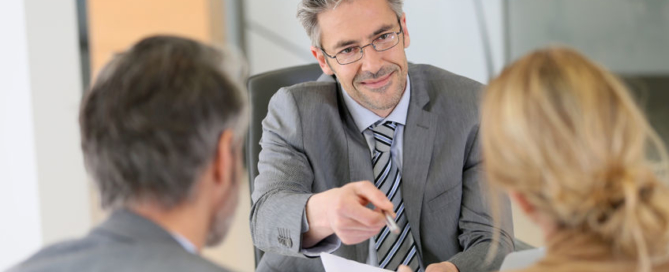 mature couple in lawyer's office