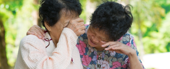 sad senior asian women in outdoor park.
