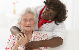 senior patient with friendly female nurse