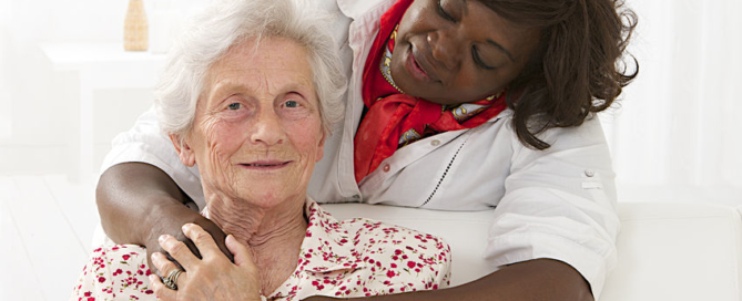 senior patient with friendly female nurse