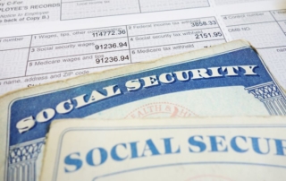 closeup of social security cards and w2 wage form