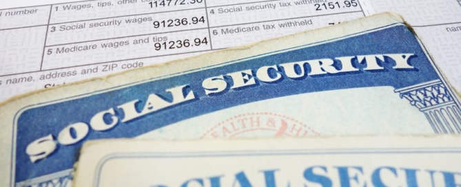 closeup of social security cards and w2 wage form