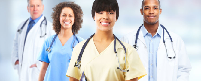 group of hospital doctors over health care clinic background.