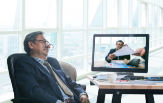 senior business man asleeping in office working time with himself working in computer monitor