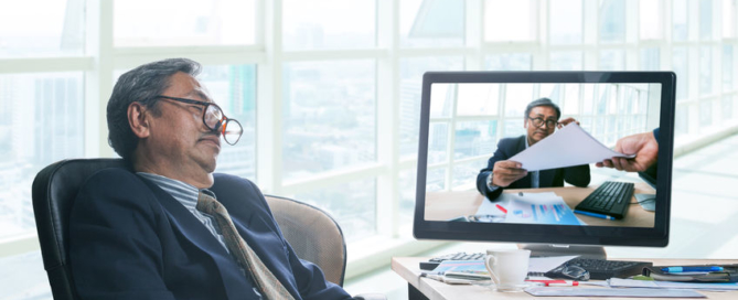 senior business man asleeping in office working time with himself working in computer monitor